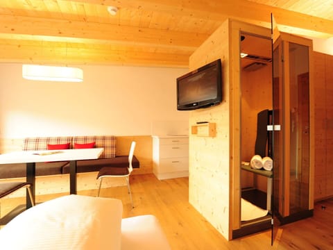 Wood, Interior Design, Ceiling, Room, Wood Stain, Hardwood, Varnish, Light Fixture, Hotel, Living Room