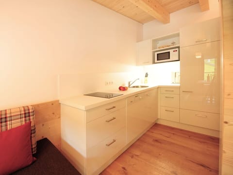 Wood, Interior Design, Flooring, Floor, Ceiling, Wood Flooring, Furniture, Cabinetry, Room, Wood Stain