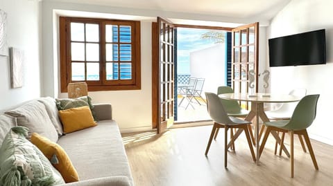 Apartment, Sea View | Living area | TV