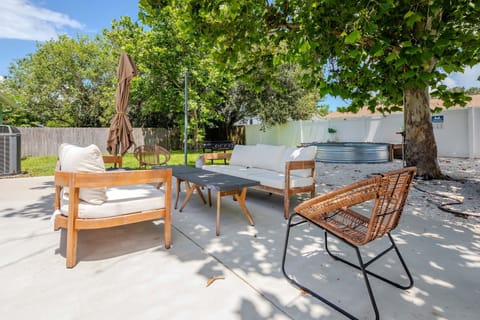 Private fenced back yard with lots of seating