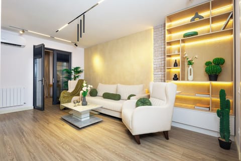 Classic Apartment, 2 Bedrooms | Living area | 50-inch flat-screen TV with cable channels