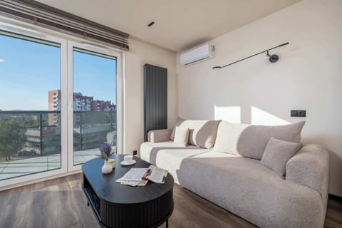 Unwind on the comfortable sofa that can be converted into double bed.