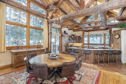 A custom dining table and bar seating for the whole family