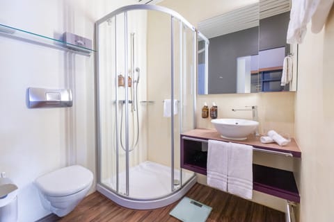 Shower, free toiletries, hair dryer, towels