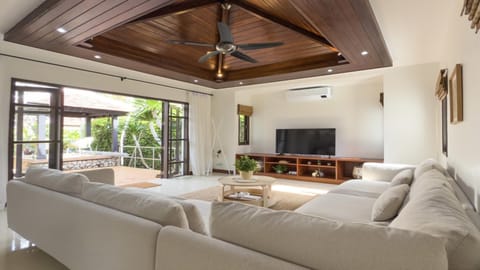 Villa, Patio, Pool View | Living area | 55-inch TV with cable channels