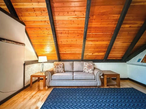 The couch in the entryway is a perfect reading nook.