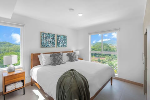 King Bedroom: Spacious and elegant, this bedroom features a luxurious king bed and soft lighting for a peaceful night’s rest.