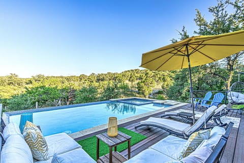Relax in this infinity edge pool overlooking Texas Hill Country