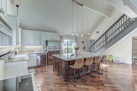 The open floor plan allows guests to stay connected throughout the home