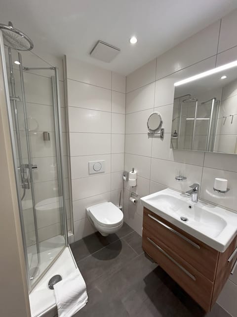 Standard Double Room, Balcony | Bathroom | Shower, hair dryer, towels, soap