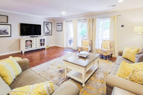 Good Morning Sunshine receives lovely natural light through the door & windows that look out onto the back deck.