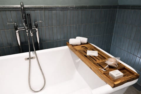 Designer toiletries, hair dryer, bathrobes, slippers