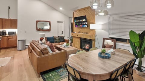 Cozy dining area beside fireplace