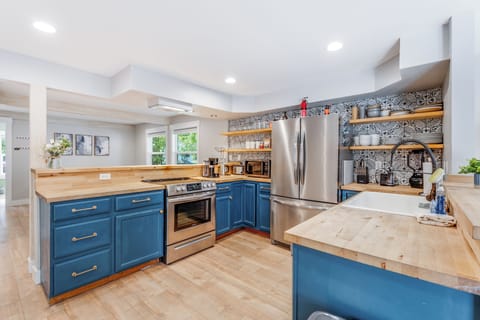 Enjoy this fully stocked kitchen perfect for cooking homemade meals | Interior