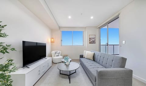 Bright and cozy living room with a comfortable sofa bed
