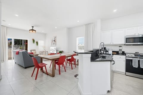 Bright kitchen with dining and living space