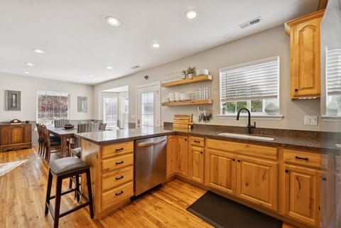 Sparkling Clean updated kitchen with solid surface countertops, hardwood floors, new LG stainless appliances, induction range, ice maker, microwave, dishwasher.  Nespresso, French press & drip coffee.  Hosts provide starter Nespresso pods and a selection of coffee grounds and supplies