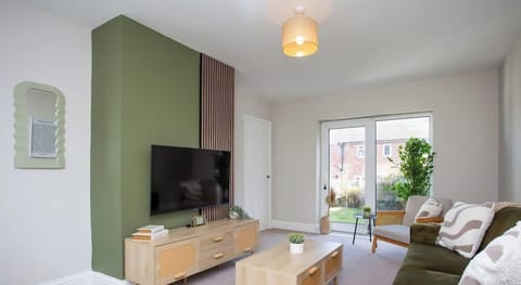 Bright living room featuring stylish décor and comfy seating.