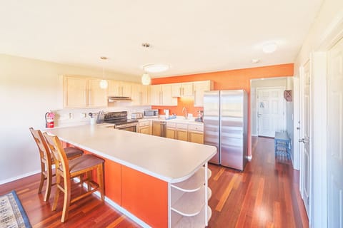 Have the kids sit at the counter and help make breakfast for some fun family memories