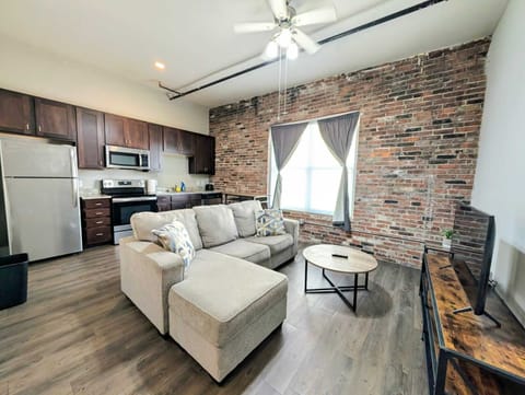 The cozy living room is designed for relaxation and entertainment.
