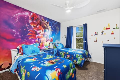 Fun Mario-themed bedroom with two twin beds