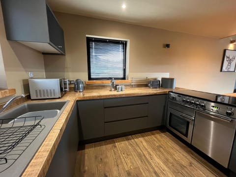 Kitchen area | White Cairn - Kylesku Lodges, Kylesku, near Lairg