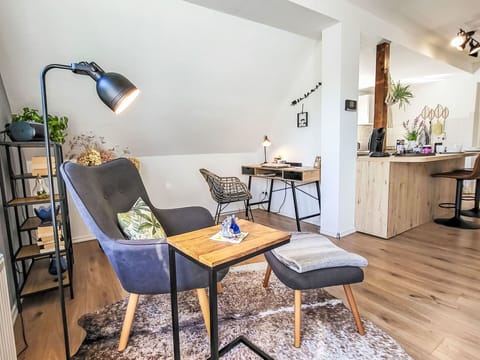 Furniture, Interior Design, Flooring, Wood, Floor, Couch, Room, Living Room, Home, Lighting