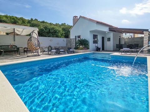 Blue, Swimming Pool, Composite Material, Resort, Leisure, Water Feature, Outdoor Furniture, Eco Hotel, Vacation, Villa
