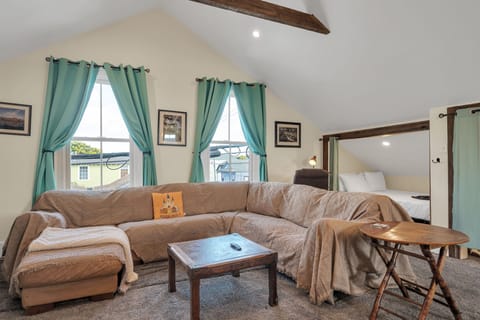 Kick back in the loft lounge w/ a comfy sectional sofa & entertainment area.

