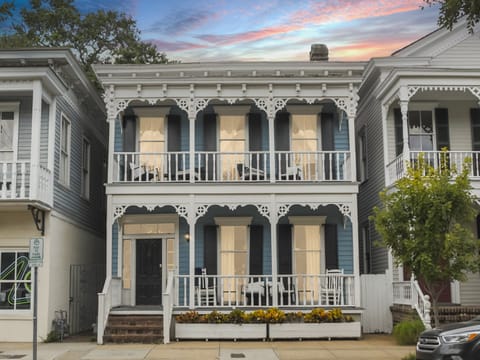 Classic Savannah charm welcomes you with this beautifully restored Victorian, featuring ornate white trim and timeless Southern character.