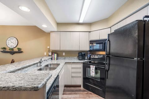 The open kitchen is well equipped for an unforgettable getaway