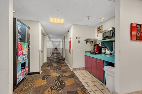 Clean, well-lit hallways with convenient vending and coffee station.
