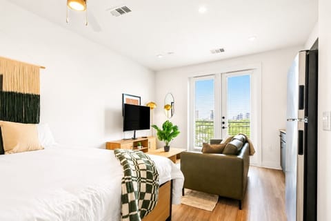 Unwind in our cozy living area designed for relaxing, streaming your favorite shows or planning tomorrow`s adventure.