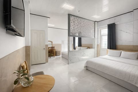 Superior Quadruple Room | In-room safe, desk, laptop workspace, blackout drapes