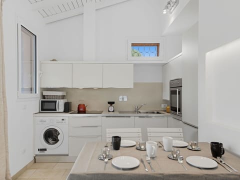 Furniture, Interior Design, Kitchen Appliance, Major Appliance, Flooring, Kitchen, Countertop, Home Appliance, Floor, Ceiling