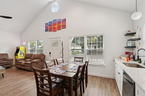 Open concept with Dining Table for 6, dishware for 10+ to include children's dishware, fully stocked kitchen, comfy reclining sofas, full-size arcade system, Smart TV, and Xbox