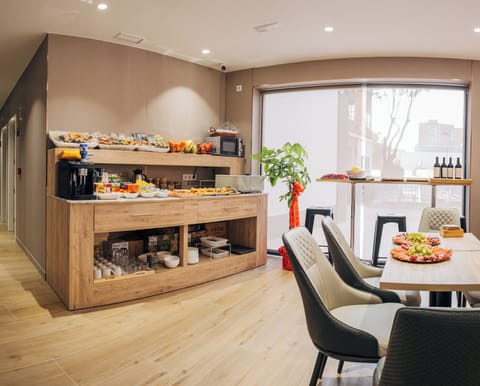 Daily buffet breakfast (EUR 8 per person)