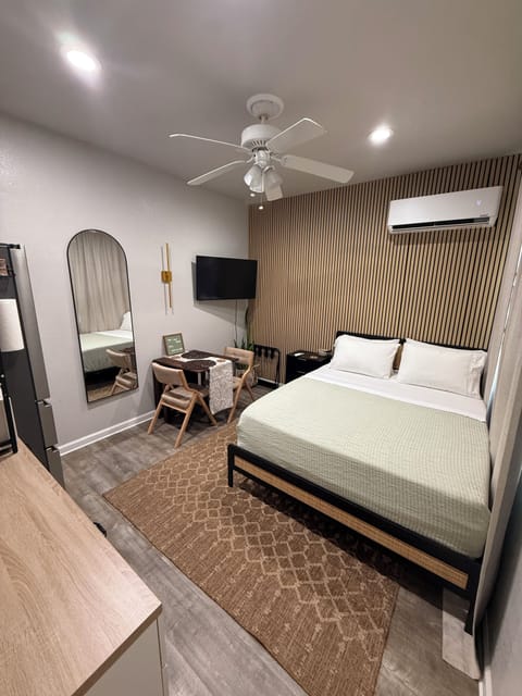 Living area, kitchenette, smart Tv, dining table, 1 of 2 Queen