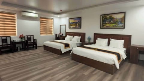 Family Quadruple Room, City View | Desk, laptop workspace, free WiFi
