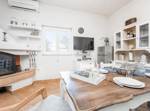 House (One Bedroom House with Terrace and Po) | Living room | 32-inch flat-screen TV with satellite channels