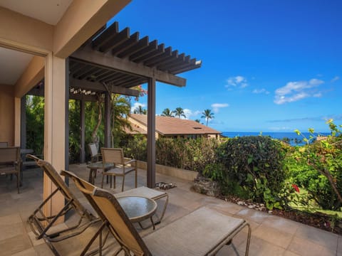 Wake up to the open ocean and swaying palms — then step out to the private lanai, where the view makes breakfast last longer.