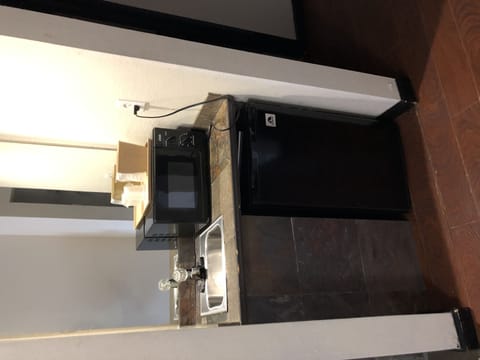 Standard Room, 1 King Bed, Jetted Tub | Mini-refrigerator