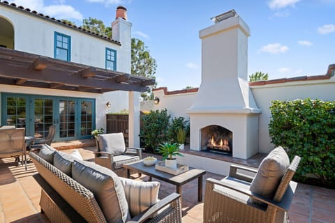 Great outdoor area with outdoor fireplace and generous seating