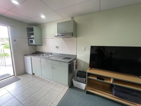 1 Bedroom G/F accessible unit | Private kitchen | Electric kettle, toaster