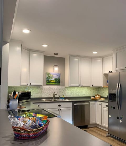 We love to cook! The Kitchen is fully equipped. Modern induction cooktop, stainless steel appliances, oven with convection and air fry capabilities for your next chef special!
