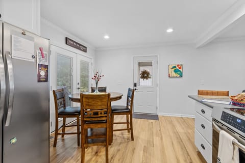 Step inside from the carport entry door to our open floor plan connecting the kitchen, dining, and living area