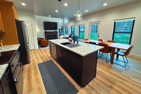 With a group-friendly open layout, this home provides the ideal space to unwind and recharge with family and friends.