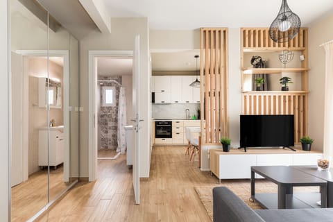 Apartment, 1 Bedroom, Balcony, City View | Living area | 40-inch flat-screen TV with digital channels