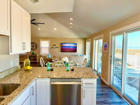 BE PART OF THE ACTION EVEN WHILE PREPARING MEALS