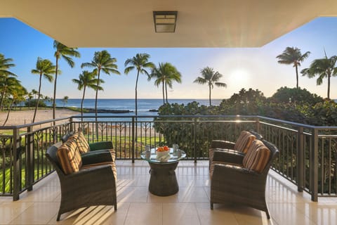 Oceanfront lanai with direct lagoon and sunset views.